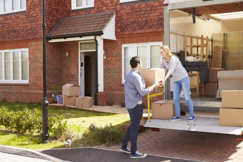 Professional house removalists loading furniture for a move in Scotland
