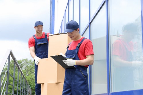 Man with a van service in Scotland loading furniture for a move