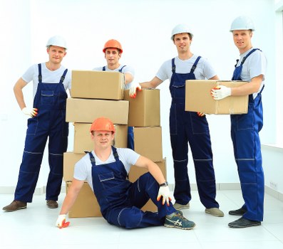 Mover wearing PPE while protecting property during relocation