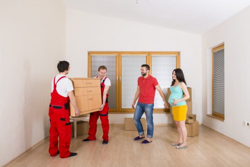 Moving team loading household items for a Scotland removals service