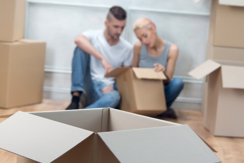 Moving day setup with boxes and furniture prepared by removalists in Scotland