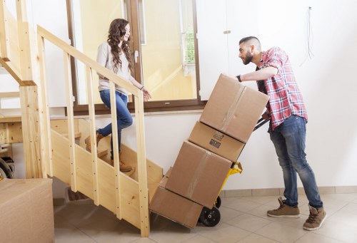 Reusable furniture and boxes prepared for charity donation after a move