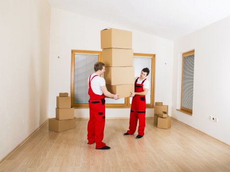Removals vehicle and packed boxes prepared for transport