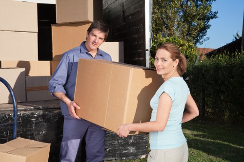 House removalists transporting furniture during a Scottish relocation